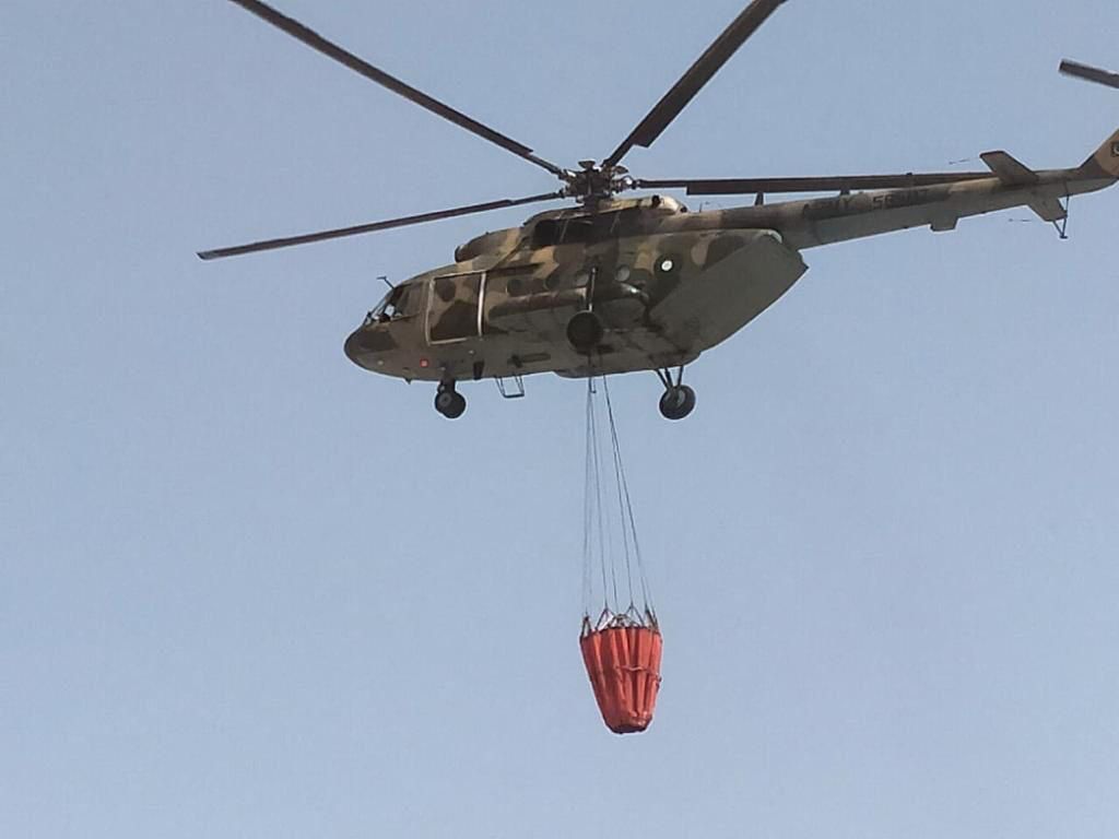 Sherani forest: Army helicopters dropping fire extinguishing chemicals, water