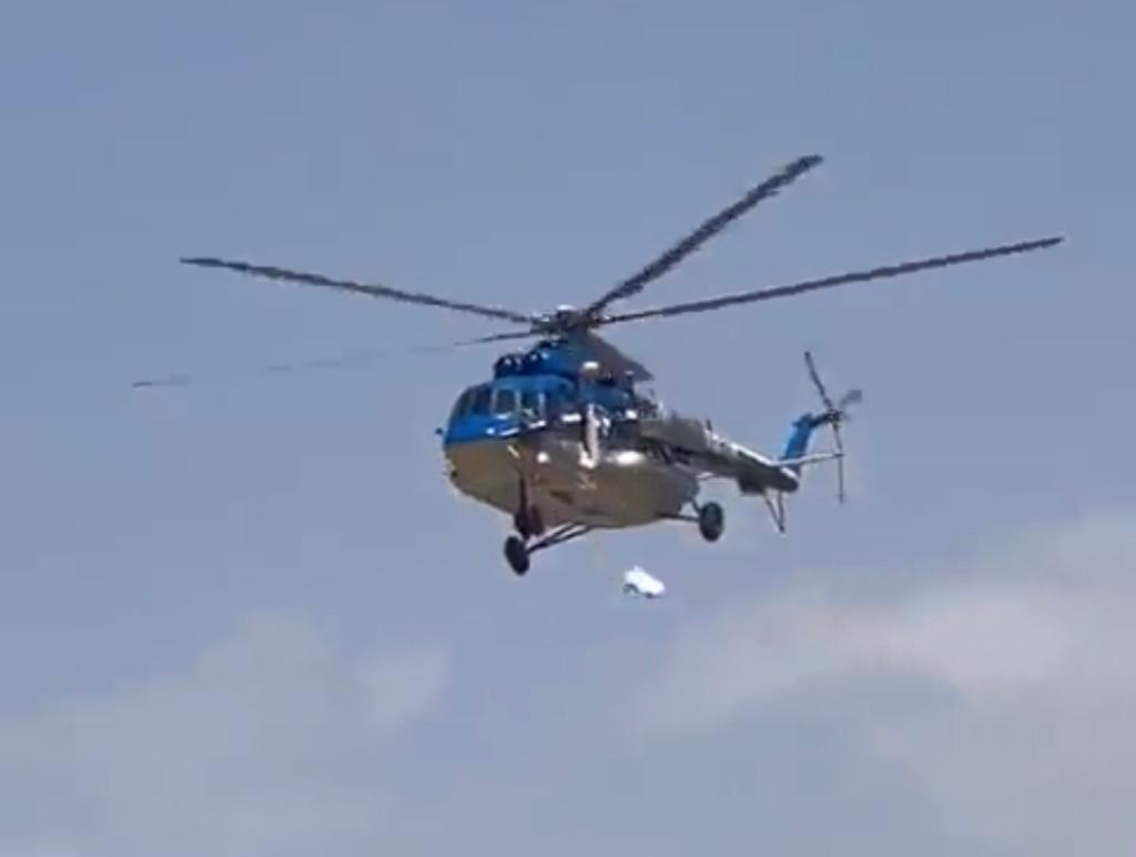 Video of Balochistan Govt helicopter dropping relief items went viral